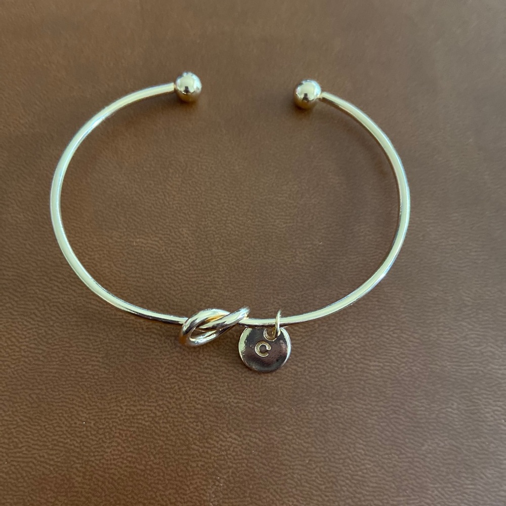 Knotted “C” bracelet